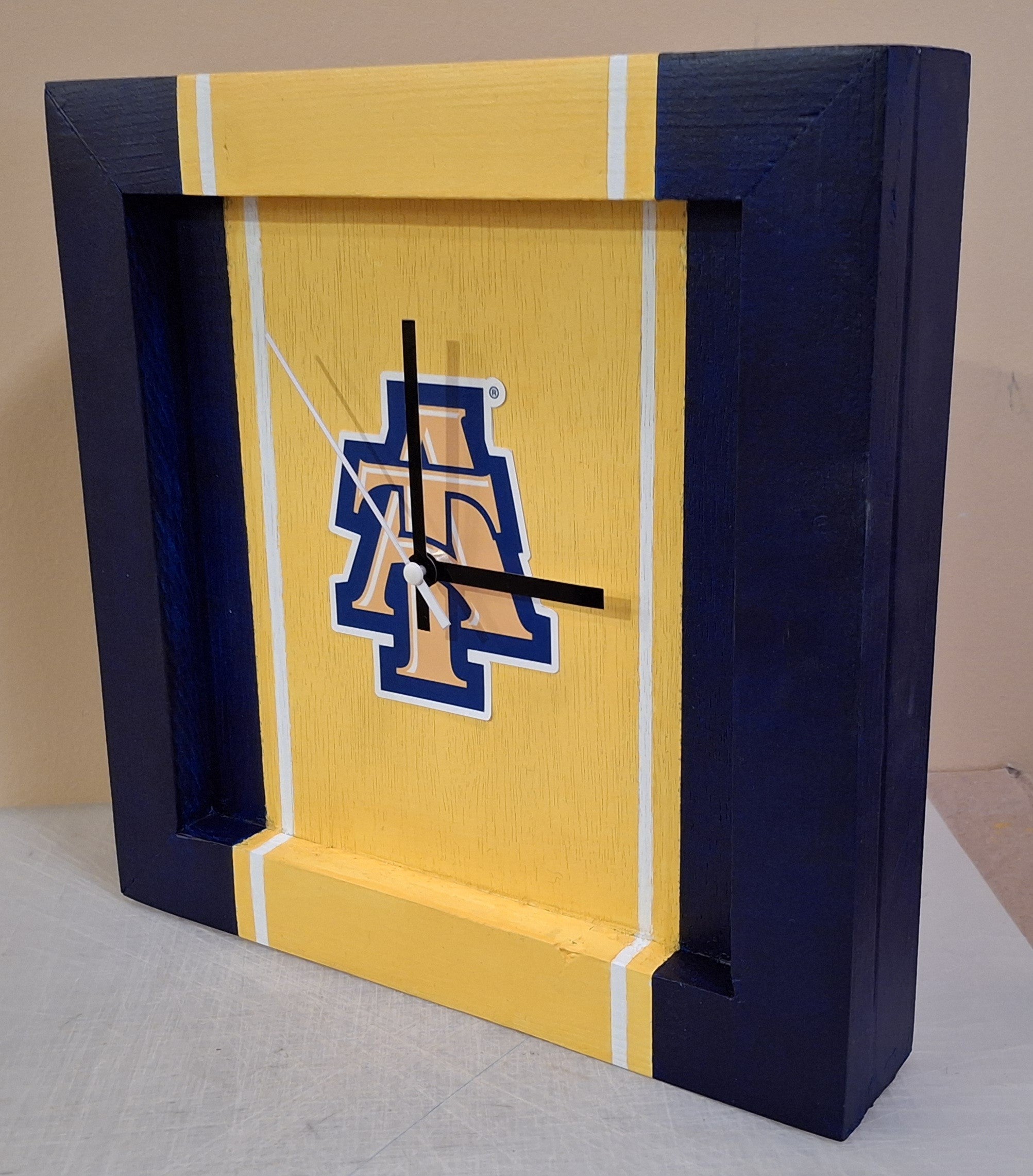 North Carolina A&T Handmade Clock 12 x 12 -Yellow Center