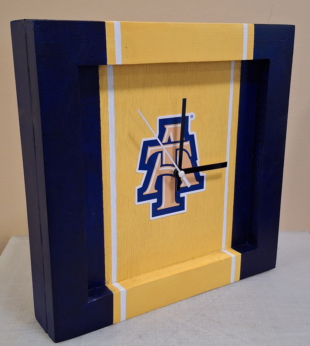 North Carolina A&T Handmade Clock 12 x 12 -Yellow Center