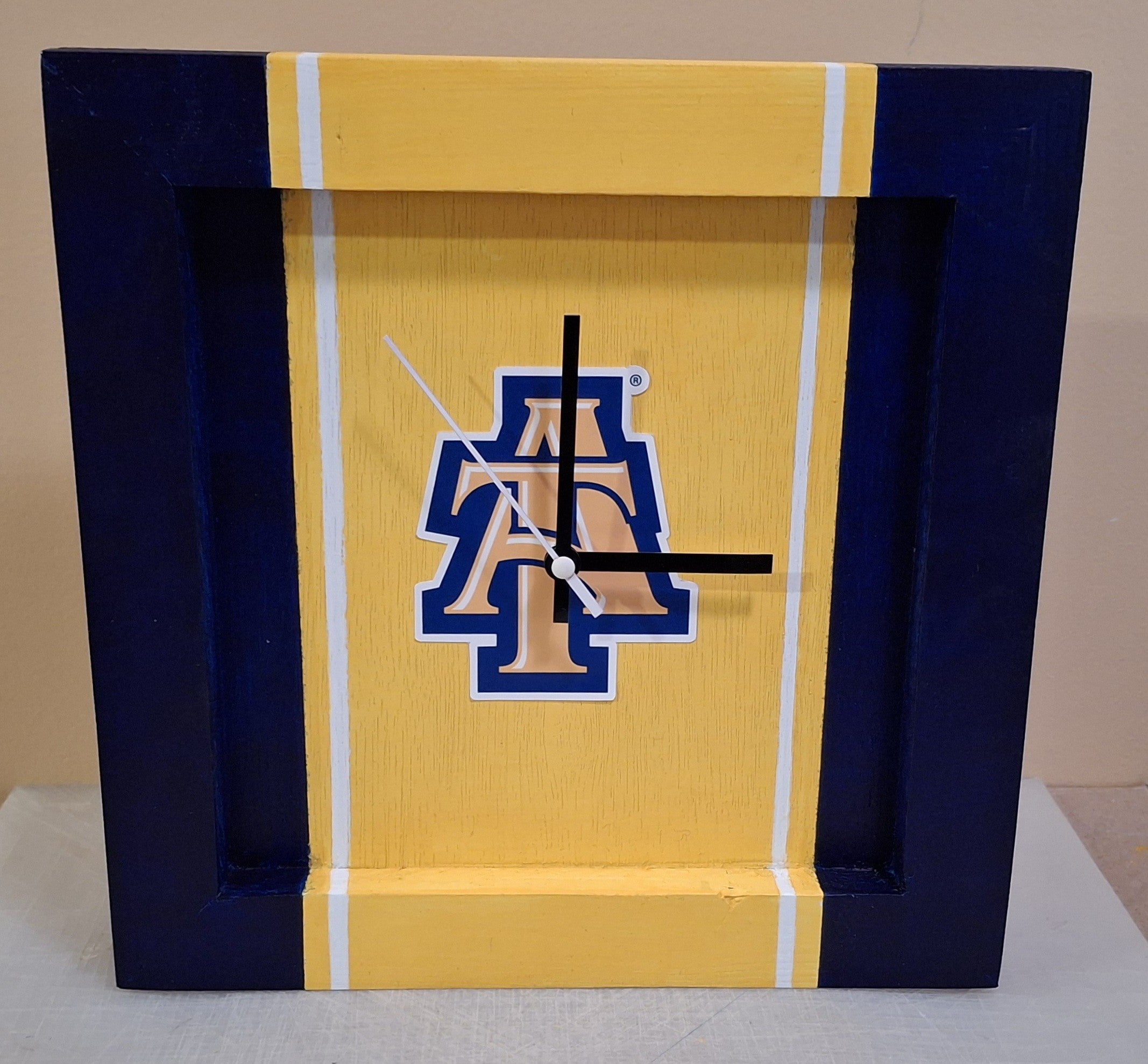 North Carolina A&T Handmade Clock 12 x 12 -Yellow Center